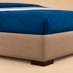Emma Fully Upholstered Bed without Storage — warm beige studio detail